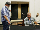 (L-R) Phil Soucy and Dawayne Dewey, mammals judges, look at other entries after judging their categories, during the World Taxidermy & Fish Carving Championships, at the Springfield Expo Center, in Springfield, Missouri on May 1, 2019.