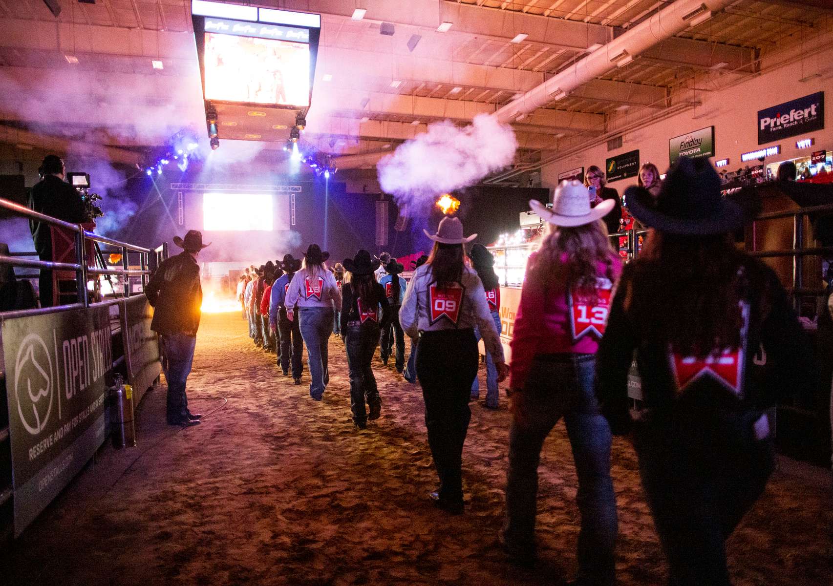 Athletes enter the arena to participate in the opening ceremony before the semi-finals and finals of the Women's Rodeo World Championship at the South Point Arena, in Las Vegas, Nevada, U.S., October 29, 2021.  