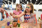 Kids are busy creating vase masterpieces at the Califia craft area at Live On Green on Friday, Dec. 29, 2017, in Pasadena, Calif. (Jordan Strauss/AP Images for HQ)