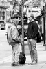 This image shows two men connecting near Fountain Square Cincinnati, OH.  One is holding a cardboard sign asking for help.  Beyond that, I can’t say much more except that poverty and homelessness are certainly not unique to people of color.  Regardless of skin color, it is important to acknowledge the humanity of the individual, treat them with respect and compassion.