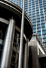 Great American Tower - Cincinnati.  The building is most often photographed showing the full height of the tower including the crowning tiara, but I wanted to give the viewer a different experience.  I decided to photograph the prominent rotunda entrance at Fourth & Sycamore, and from a somewhat disorienting perspective, using the flagpole in the center of the frame to give the image an uncertain, fractured appearance. My idea was to play with the viewer’s expectations and preconceptions about architecture and landscape photography.  I think of the flagpole as an intervention between the viewer and the subject to further amplify the visual discontinuity. Great American Tower at Queen City Square is a state-of-the-art 41-story office tower located in the heart of downtown Cincinnati's business district.  Hellmuth Obata & Kassabaum architect designed he tower, and construction was completed in 2011.  This building surpassed the Carew Tower to become the city's new tallest building.The tiara (not shown here, but in many images online) was inspired by Cincinnati's nickname, Queen City, and by a photograph of a tiara worn by Diana, Princess of Wales.  The tiara is made of steel tubes, weighs 400 tons.130 feet tall and measures 159 feet from east to west and 93 feet from north to south.  