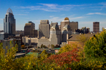 This is a view of downtown Cincinnati from a hillside in Mt. Adams.  Cincinnati is a city in the United States state of Ohio and is the government seat of Hamilton County. Settled in 1788, the city is located at the northern side of the confluence of the Licking and Ohio rivers. The city drives the Cincinnati–Middletown–Wilmington combined statistical area, which had a population of 2,172,191 in the 2010 census.  With a population of 301,301, Cincinnati is the third-largest city proper in Ohio and 65th in the United States. It is the fastest growing economic power in the Midwestern United States based on percentages and the 28th-biggest metropolitan statistical area in the United States. Cincinnati is also within a single day's drive of two-thirds of the United States populace.