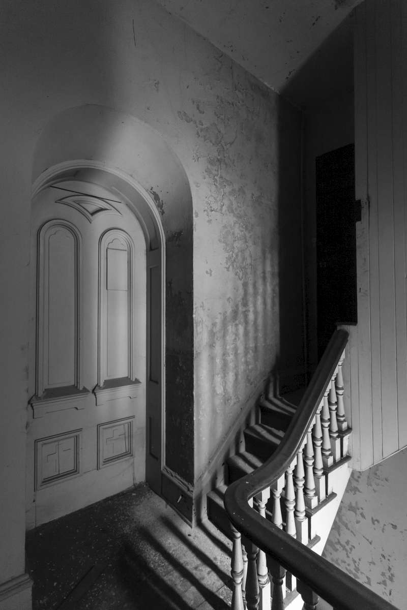 Old Saint George Church is a historic Catholic church in the Clifton Heights neighborhood of Cincinnati, Ohio, near the University of Cincinnati. The door in the shadows leads to a stairway up to the bell tower that had towered over the city since 1873, and was destroyed in a fire in 2008.