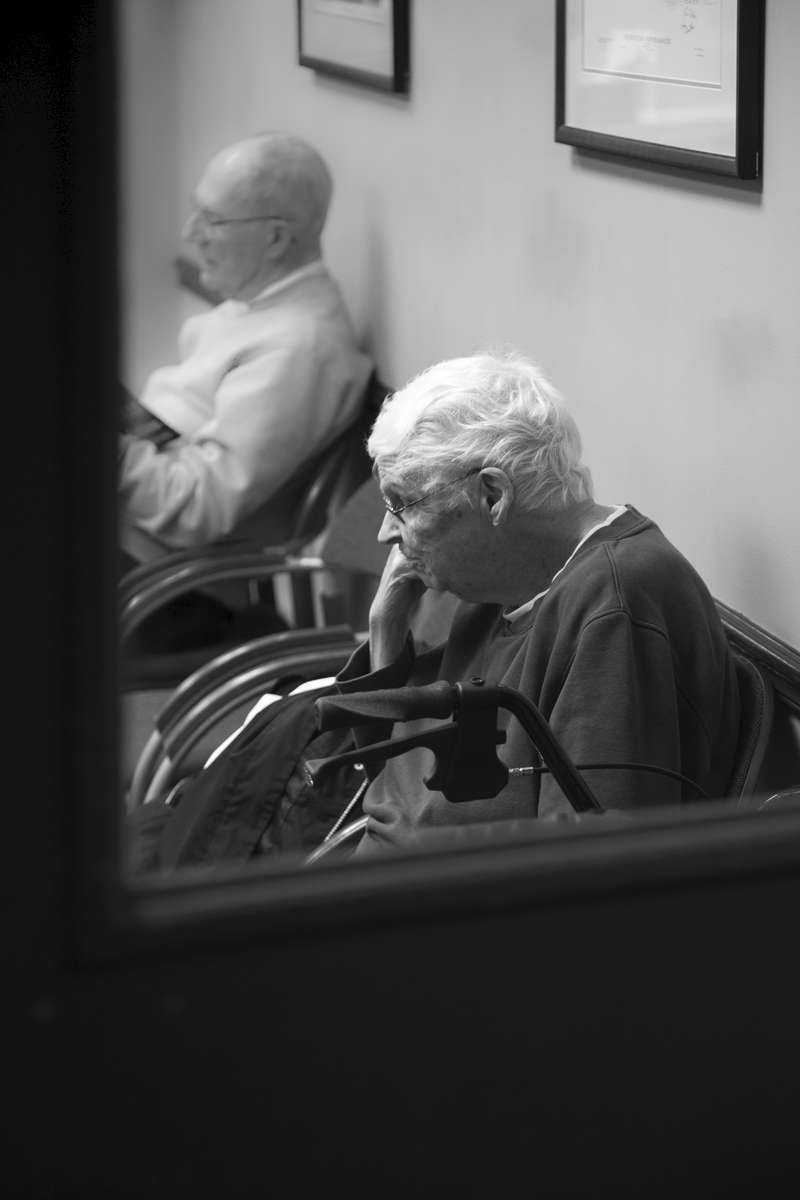 Medical Center - Ohio Image of elderly gentlemen in physician’s waiting room.  After a certain age, one often ponders human, and individual mortality, and a routine visit to the doctor’s can become a life-altering event.  