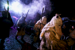Participants dressed as Krampus creatures walk the street during the Krampus gathering in Goricane, Slovenia, Nov. 21, 2015. In Central European alpine folklore, Krampus is a demonic creature traditionally following St. Nicholas and angels on the evening of December 5. It pries on children who were not good during the year.