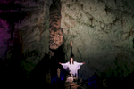 A performer represents an angel during the world's largest Nativity scene in a cave, staged in Postojna Cave in Slovenia, Dec. 25, 2015.