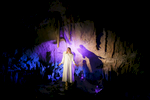 A performer represents an angel during the world's largest live Nativity scene in a cave, staged in the world-famous Postojna Cave in Slovenia, Dec. 25, 2015.