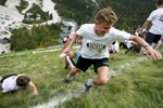 Competitors compete in a relay run up the ski flying hill during the Red Bull 400 race in Planica, Slovenia, Sep. 19, 2015.