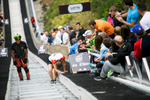 A competitor struggles to run up the ski flying hill during the Red Bull 400 race in Planica, Slovenia, Sep. 19, 2015.