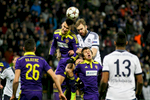 Jan Kirchhoff of FC Schalke 04 and Arghus of NK Maribor jump for the ball during the UEFA Champions League Group G match on December 10 in Maribor, Slovenia.
