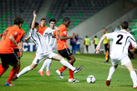 Queensy Menig of Netherlands is challanged by Giorgi Papunashvili of Georgia during the UEFA U-17 European Championship semi-final match between Netherlands and Georgia at the SRC Stozice Stadium in Ljubljana, Slovenia, May 13, 2012.