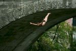 A competitor dives from a bridge over river Soca during an annual diving competition in Kanal, Slovenia, August 16, 2015.