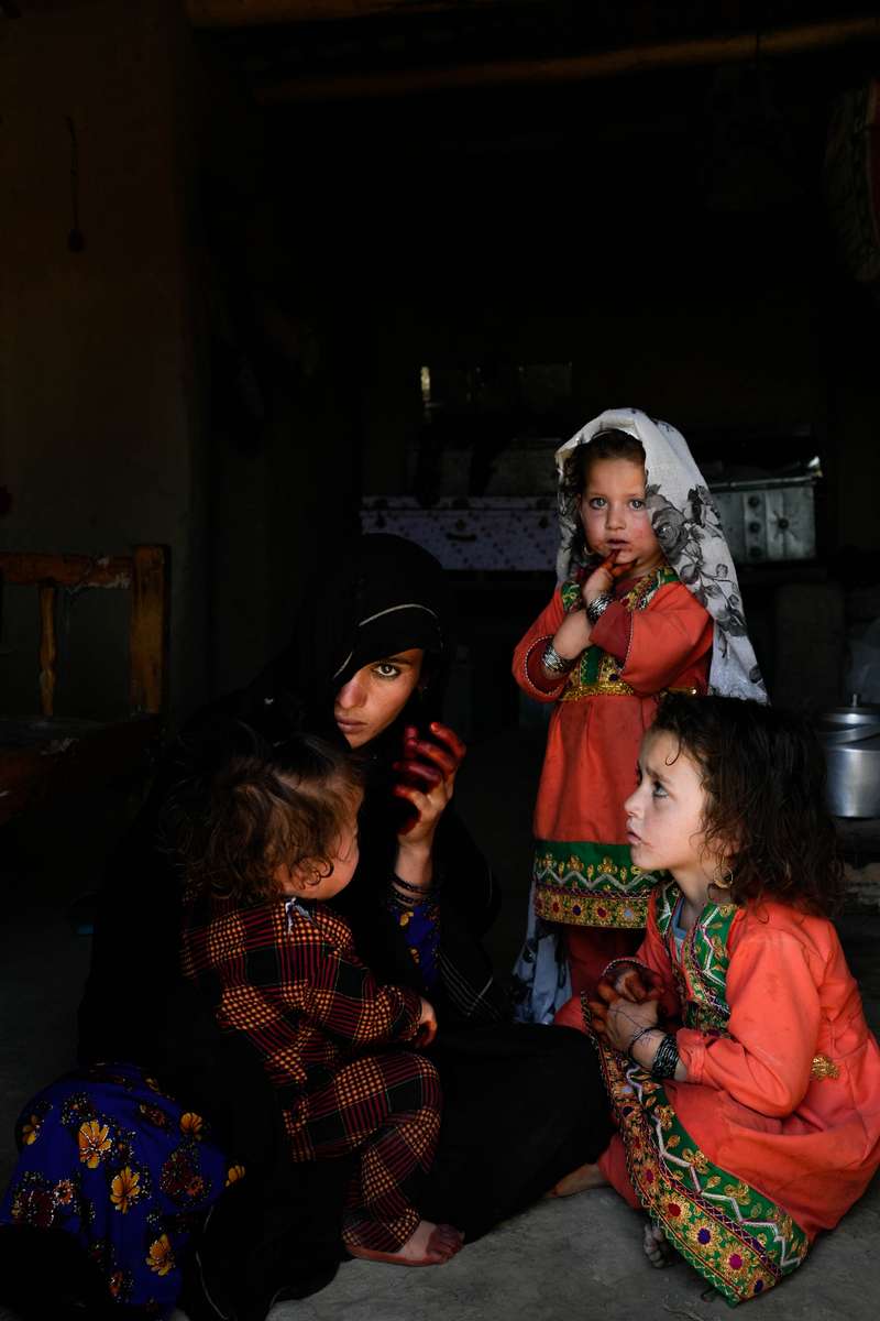 Widow and her three daughters living in Bagrami refugee camp outside Kabul