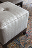 Re-upholstered button tufted ottoman 