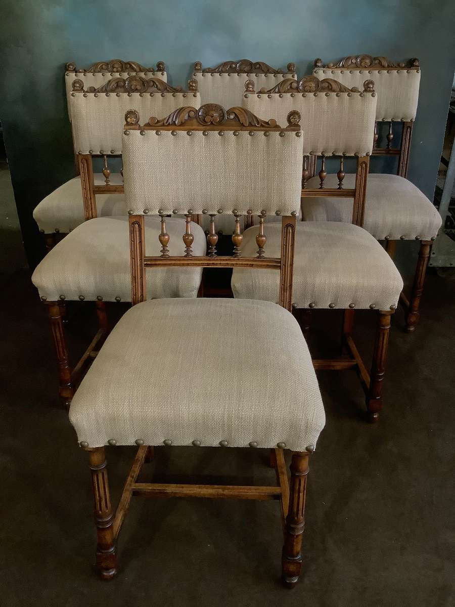 Where do you see custom designed dining chairs? Beautifully designed detailed wood, sturdy and strong, with burlap-like linen upholstery tacked with nailheads to complete the look.18” x 18” x 42”Our Price $2,400