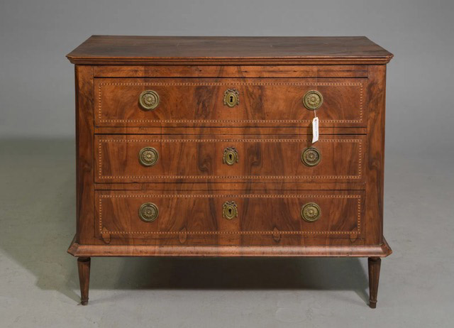 This French Louis XVI-style commode is a stunning piece crafted from walnut. The true beauty of this chest lies in its refined details and clean lines, making it an ideal fit for both contemporary and traditional interiors. It would be perfect as a dresser in a bedroom or as a decorative piece in a foyer or living area, offering both storage and a stylish display surface.43.5 x 21 x 35.5”Our Price $3,100