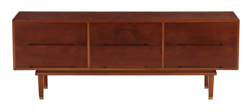 Clean and simple mid-century modern walnut credenza/dresser with stunning wood grains. This piece packs a punch—from its long tapered legs with brass caps to the ample storage space offered among its six deep and spacious dovetailed drawers. The newly refinished tabletop and drawer fronts showcase the gorgeous, pronounced wood grains.71{quote} x  17.75{quote} x 26{quote}Our Price $3200