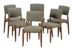 An exquisite set of mid-century modern side chairs crafted circa 1960-1969. Reupholstered in a warm green tone that aligns with the latest design color trend.  A perfect blend of vintage charm and contemporary comfort, these side chairs are a statement piece for any discerning home.20{quote} x 21{quote} x 33.25{quote}Our Price   $1,650