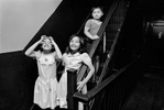 Kam Ho Lee's grandchildren play on the stairway, 9 Eldridge St., 1983.