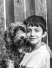 portrait of a boy and his dog