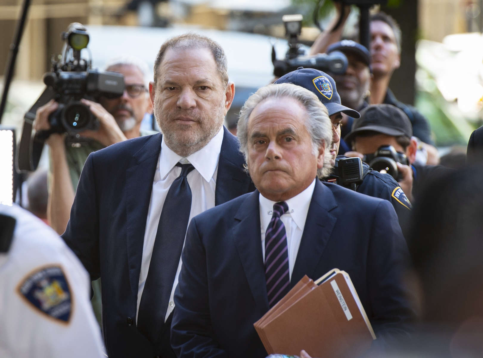 Former American film producer Harvey Weinstein, accused of two counts of rape and one first-degree criminal sex act, arrives with his lawyer Benjamin Brafman before pleading not guilty inside Manhattan Criminal Court in New York City on Tuesday, June 5, 2018.  