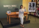 Kim Kardashian poses for photos inside Barnes & Noble at 555 5th Avenue in Manhattan before her book signing on Tuesday, May 5, 2015.