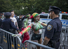 Parade participants go through NYPD check point as they arrive at the annual J'Ouvert Parade held in Crown Heights, Brooklyn on Monday September 4, 2017. The pre-dawn festival of J’Ouvert that translates to {quote}day break{quote} is celebrated by people of West Indian decent to mark the start of the Caribbean carnival celebrations. (Anthony DelMundo/New York Daily News)