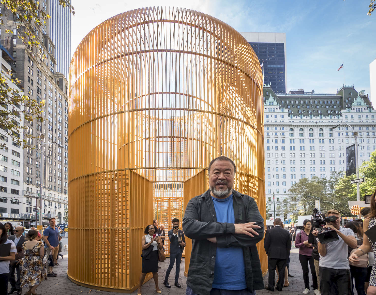 Chinese contemporary artist and activist Ai Weiwei poses for photos after the news conference concerning his instillation titled Good Fences Make Good Neighbors, at the corner of 5th Avenue and 60th Street in Manhattan on Tuesday, October 10, 2017. The multi-venue exhibition instillation titled Good Fences Make Good Neighbors is inspired by the international migration crisis and current global geopolitical landscape. 