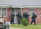 Federal agents wearing hazmat suits raided the home of Paul Kevin Curtis,45, who was arrested for allegedly sending letters containing ricin to President Barack Obama and Senator Roger Wicker, R-Mississippi, located at 802 Redwood Drive in Corinth, Mississippi on Thursday, April 18, 2013.