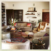 Collections of textiles and rugs are colourful highllghts to the this gathering space.
