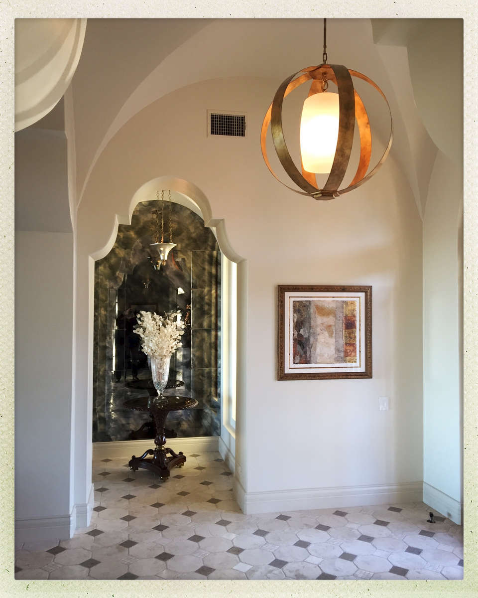The Entry Hall as drawn featured simple arches.  I upgraded the look to mission arches, imagining that globe chandelier floating right through the top.