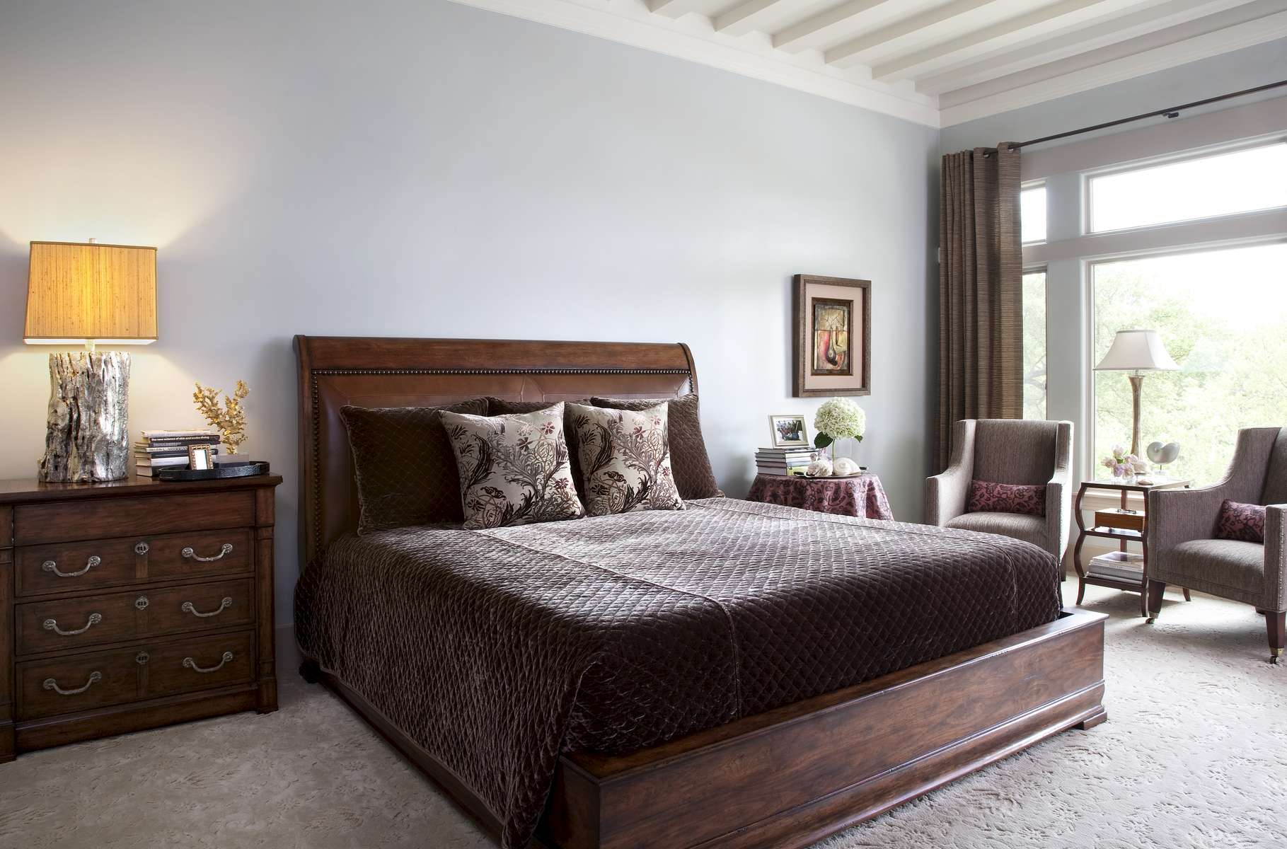 The ceiling beams were added to bring the comfort of Tuscany to the bedroom.