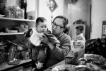 CAIRO, EGYPT - JANUARY 22 : Yuzhi Zhou hold hers her daught Ziqi Ai as they share the tradition homemade Chinese meal at their home in celebration for Chinese New Years on January 22, 2012 outside Cairo, Egypt. Ziqi Awas born in Egypt, despite China's one child policy. 