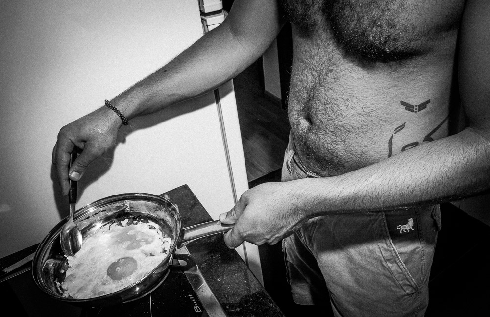 Former snipper, fries eggs in rented appartment in Lapa, in Rio de Janeiro.  Member of the US backed {quote}Free Syrian army{quote} or in his own words, {quote} a collalition of the youth of his village then others{quote}, left Syria after two years when ISIS ( Islamic State of Iraq and Syria ) began actions on the {quote}other{quote} front.  Unadmittedly realizing there was no hope, he left his country of birth, Syria. Traveling from to Lebanon, then to Europe, he is hosted by family in Brazil. 