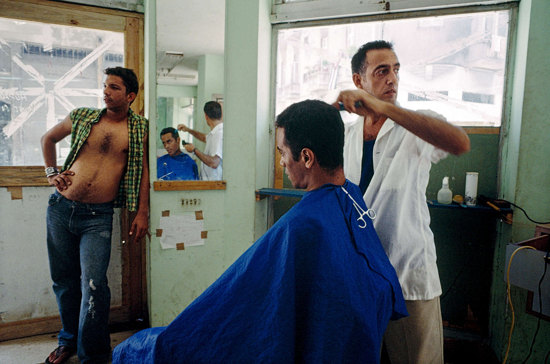Javier waiting for his haircut.Havana, Cuba