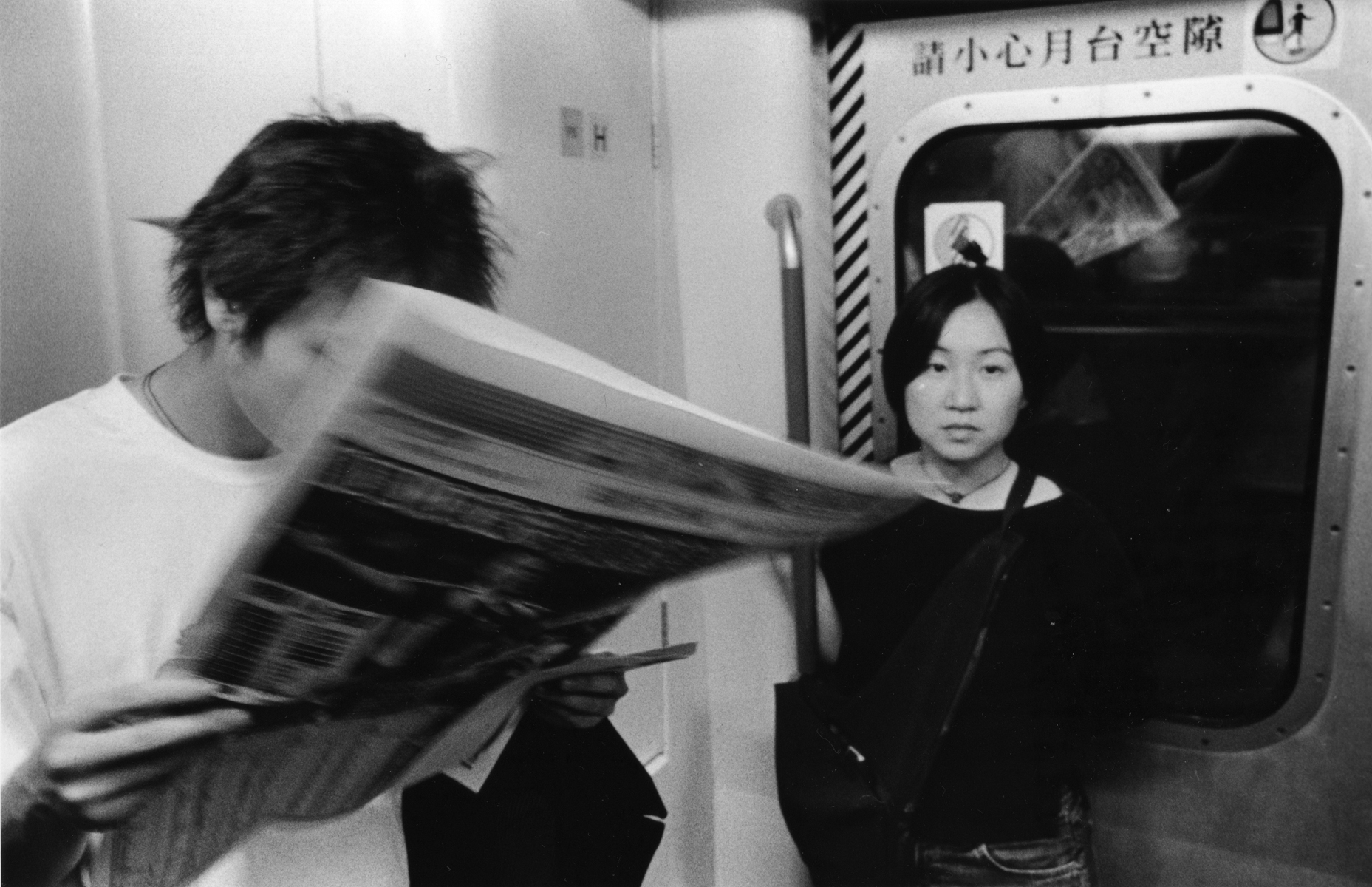 Chi Ying rides the subway home after a long day of work. Hong Kong Island