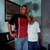 Lorenzo's son, embraces his mother. Havana, Cuba