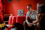 Stephen, 25, who is unemployed, sits in the living room of the house in the  Protestant Roden Street area of south Belfast where he lives with his wife and three children.  {quote}They're trying to take our culture away.{quote} he said, expressing a general sense of unease among young working-class Protestants.