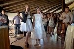 A communion celebration near the town of Caserta. The girl who celebrates her communion is overcome by emotion by the performance of her idol.