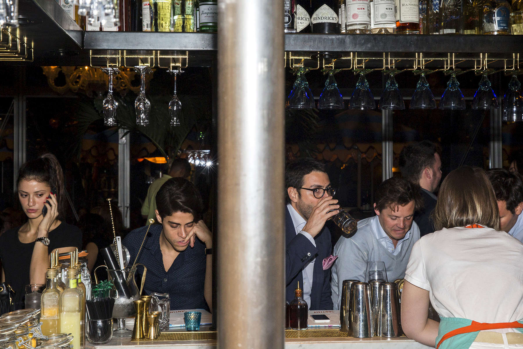 Customers at the bar at Santina restaurant in New York, NY