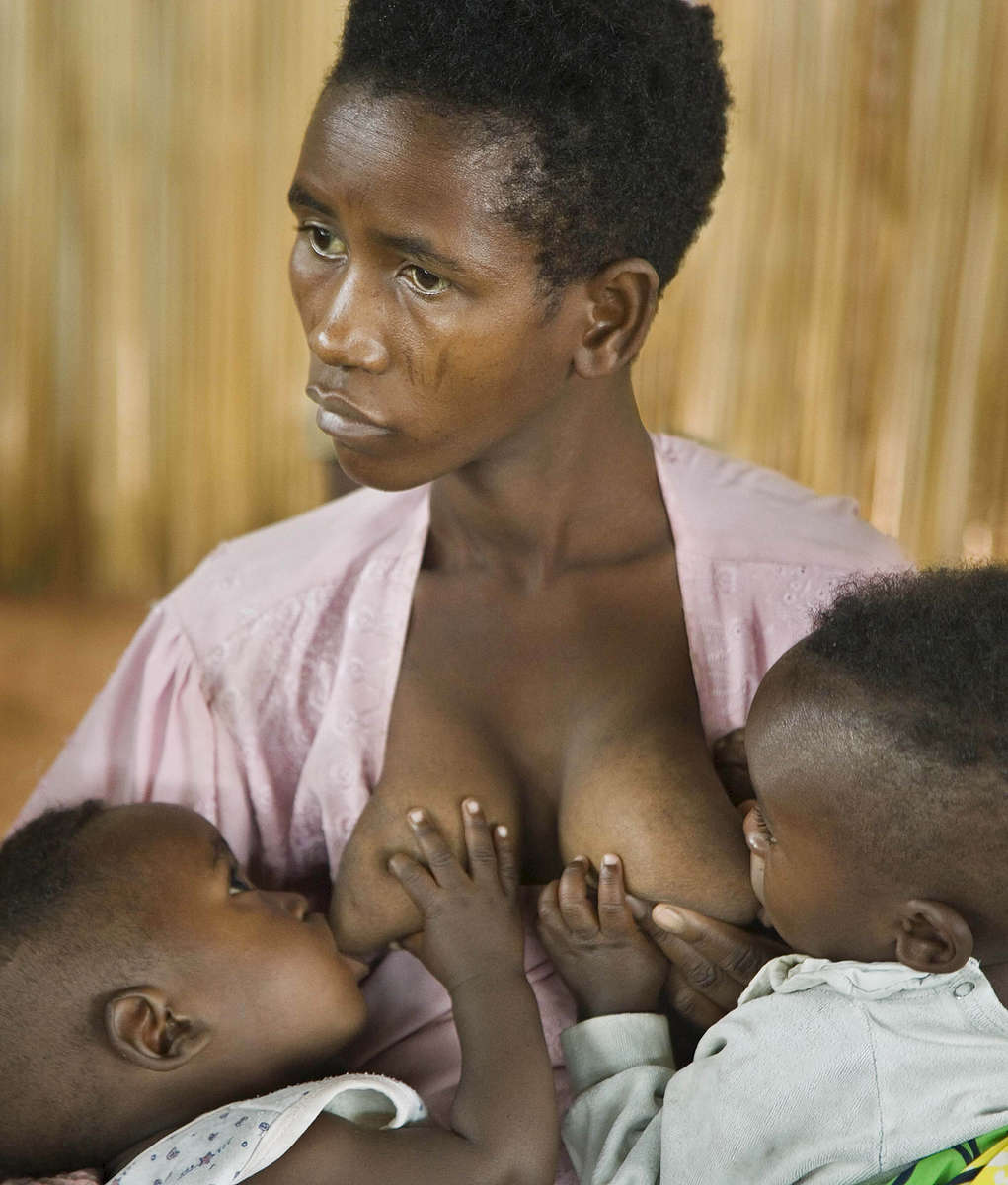 Batwa woman and twins, Rwanda