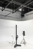 Camera stand, laptop station and a rolling monitor make shooting a breeze on the studio cyc wall.