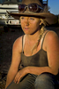 22-year-old Cassandra is one of only two women who are part of the mustering team. The workers get free meals and accommodation and are paid between a$600 and a$800 per week. 2011, Northern Territory, Australia.