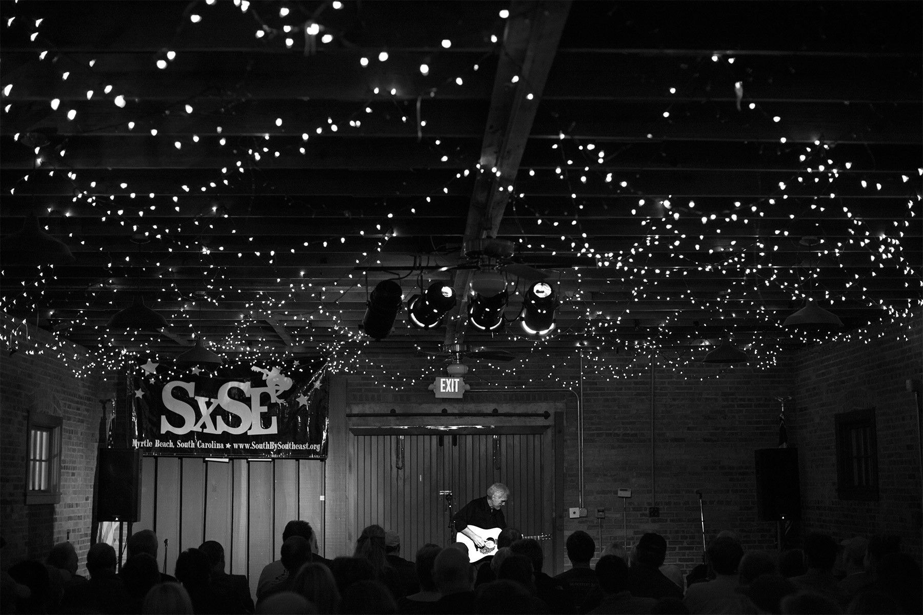 A SXSE favorite, Oklahoma born songwriter Verlon Thompson has played the series three times since it was started. He has been  a professional songwriter and traveling troubadour for 30 years and served as the trusted sidekick of the late Texas Americana songwriting icon Guy Clark. This photo was from his performance in November of 2012.