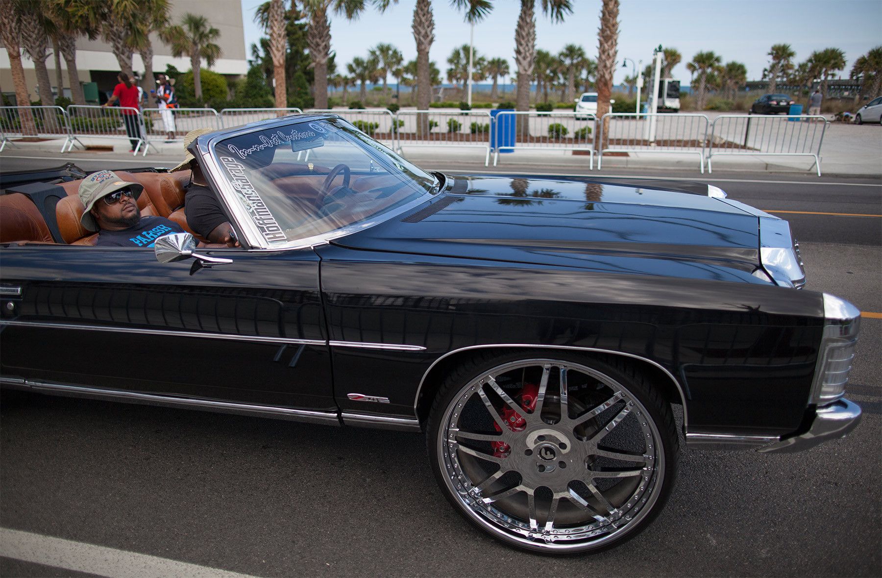 A customized car cruises down Ocean Boulevard during the 2015 Atlantic Beach Memorial Day BikeFest in Myrtle Beach, South Carolina May 22, 2015. After three people were killed and seven wounded in shootings during 2014 Bikefest, State officials called for an end to the event that draws thousands to the family-friendly beach town.Their efforts were unsuccessful. Bikers returned to Myrtle Beach - just a week after a bloody motorcycle gang shootout in Waco, Texas. But this time authorities are more prepared, with dozens of new surveillance cameras and a police force three times the size of last year’s.    REUTERS/Randall Hill
