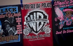 T-shirts are for sale at a vendor's booth during the 2015 Atlantic Beach Memorial Day BikeFest in Atlantic Beach, South Carolina May 22, 2015. After three people were killed and seven wounded in shootings during 2014 Bikefest, State officials called for an end to the event that draws thousands to the family-friendly beach town.Their efforts were unsuccessful. Bikers returned to Myrtle Beach - just a week after a bloody motorcycle gang shootout in Waco, Texas. But this time authorities are more prepared, with dozens of new surveillance cameras and a police force three times the size of last year’s.    REUTERS/Randall Hill