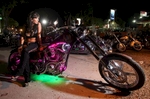 Christina Davie of Christiansburg, Va., waits outside the biker bar Suck Bang Blow in Murrells Inlet, South Carolina, May 19, 2012, during the annual Harley-Davidson Motorcycle Spring Rally in and around Myrtle Beach. Picture taken May 19, 2012.  REUTERS/Randall Hill