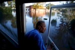 Eric McClary of West Mulberry Lane checks flood levels while checking on his flooded home after the effects of Hurricane Matthew in Goldsboro, North Carolina, U.S., October 12, 2016. REUTERS/Randall Hill